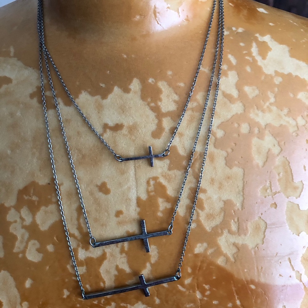 Silvertone triple cross necklace